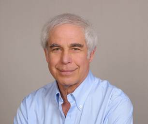 A person in a blue shirt

Description automatically generated